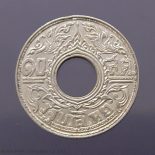 1941 – 10 satang hole coin, silver, Kanok Khaeng Singh pattern, used